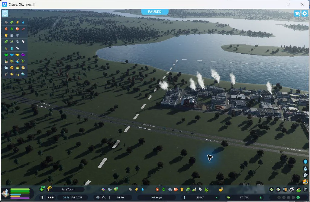 17:54 — Before the purchase: open ground beside the highway and established industrial waterfront. The service tile purchase was verified at 17:59. This view supplies the missing geographical context for the new site.